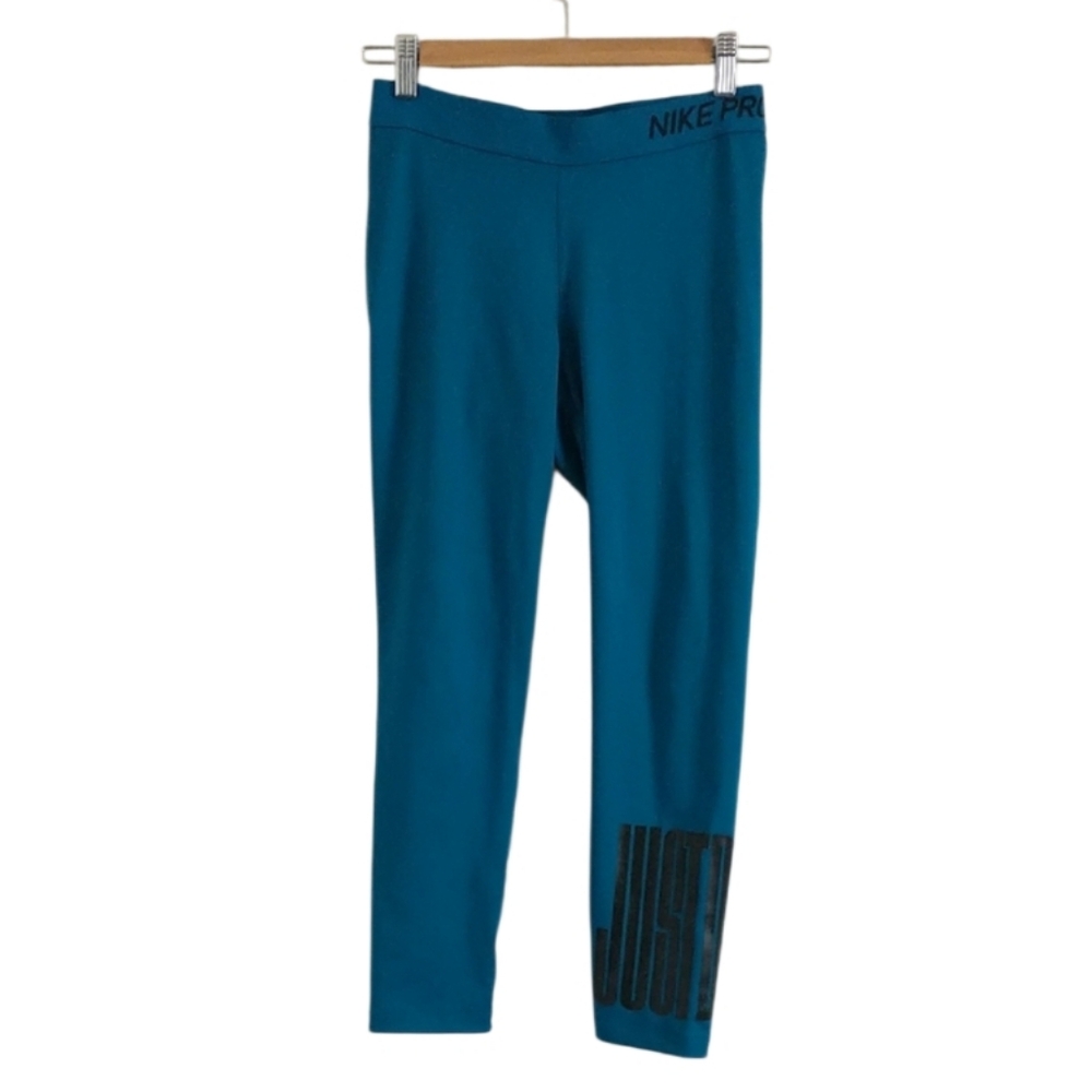 Nike Women's Teal Leggings with Black Accents. Size M